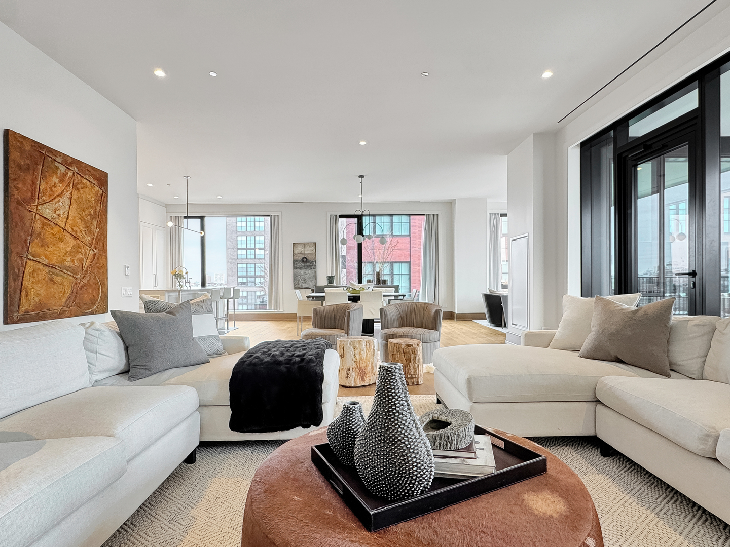 21 North May Street, Unit 802 Chicago, IL 60607 - Photo 11 of 50 a living room with furniture and a large window