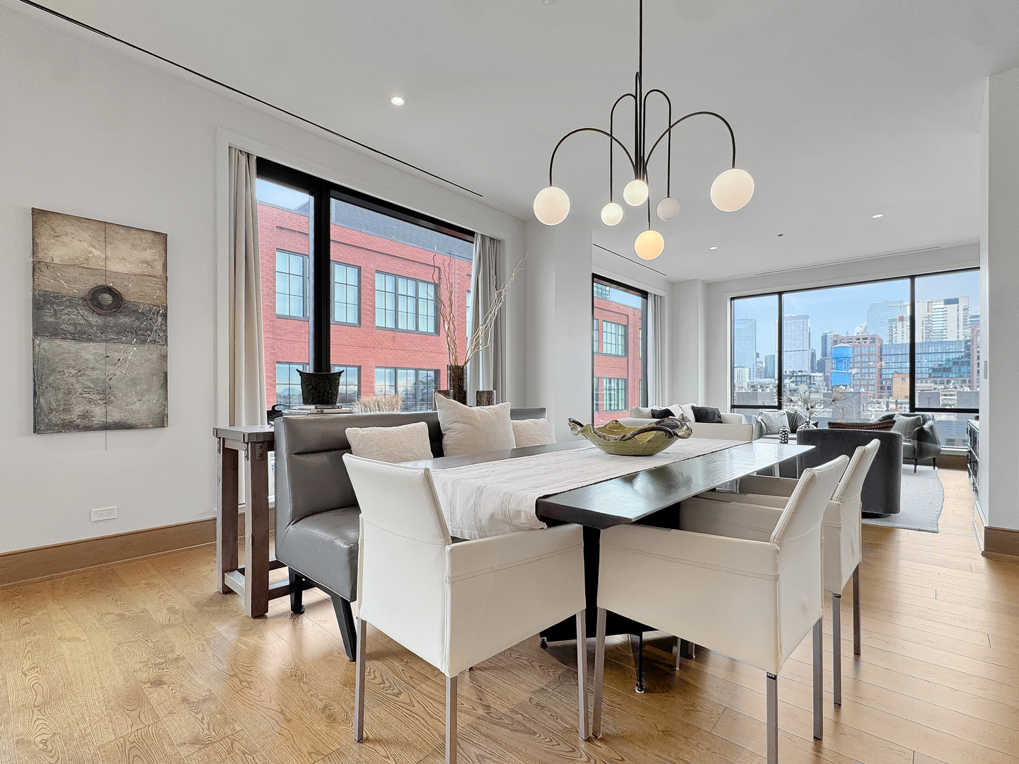 21 North May Street, Unit 802 Chicago, IL 60607 - Photo 13 of 50 a view of a dining room with furniture window and wooden floor
