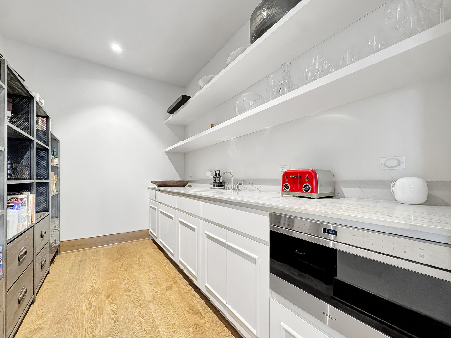 21 North May Street, Unit 802 Chicago, IL 60607 - Photo 18 of 50 a storage room with cabinets