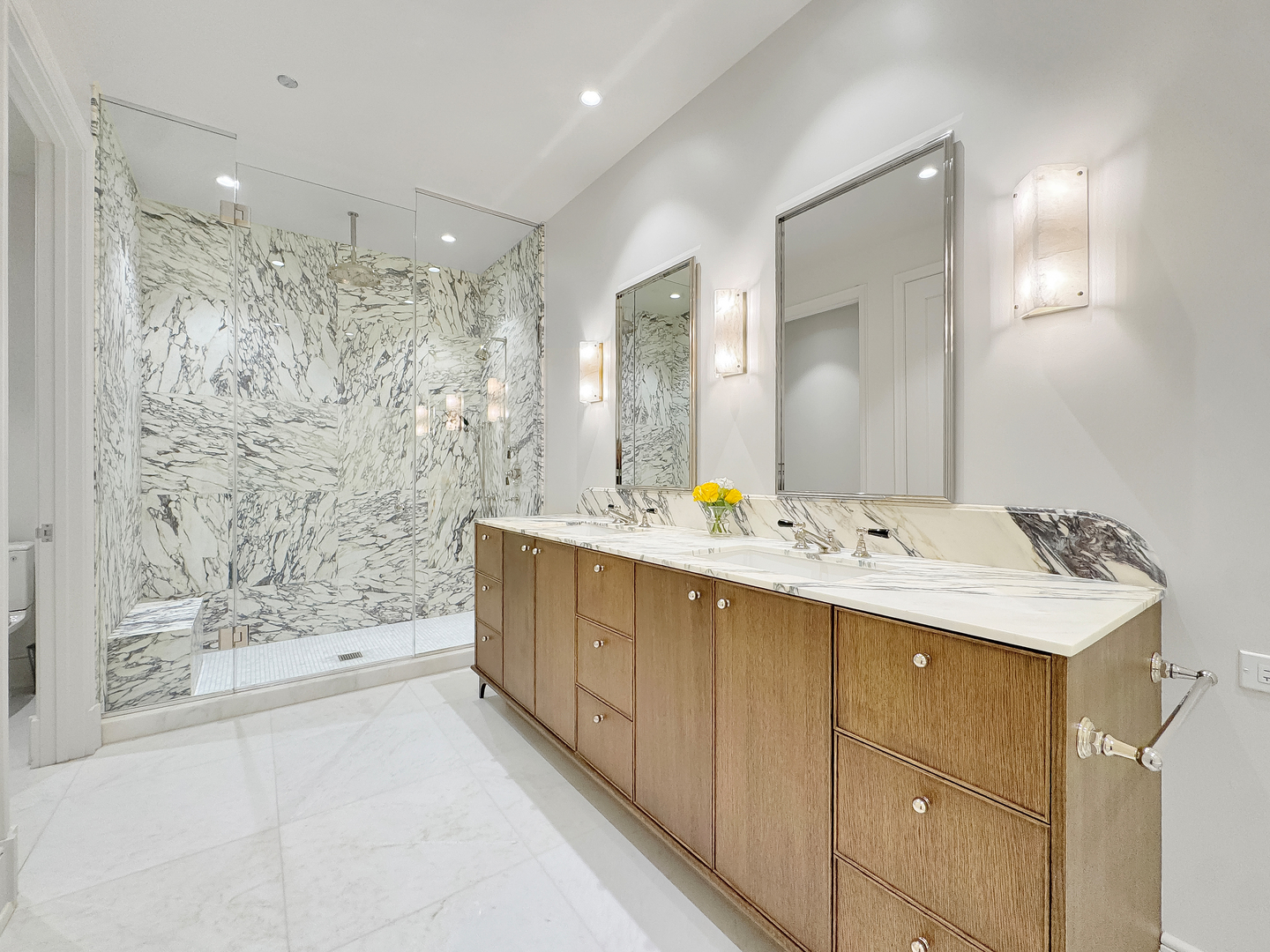 21 North May Street, Unit 802 Chicago, IL 60607 - Photo 26 of 50 a bathroom with a double vanity sink mirror and shower