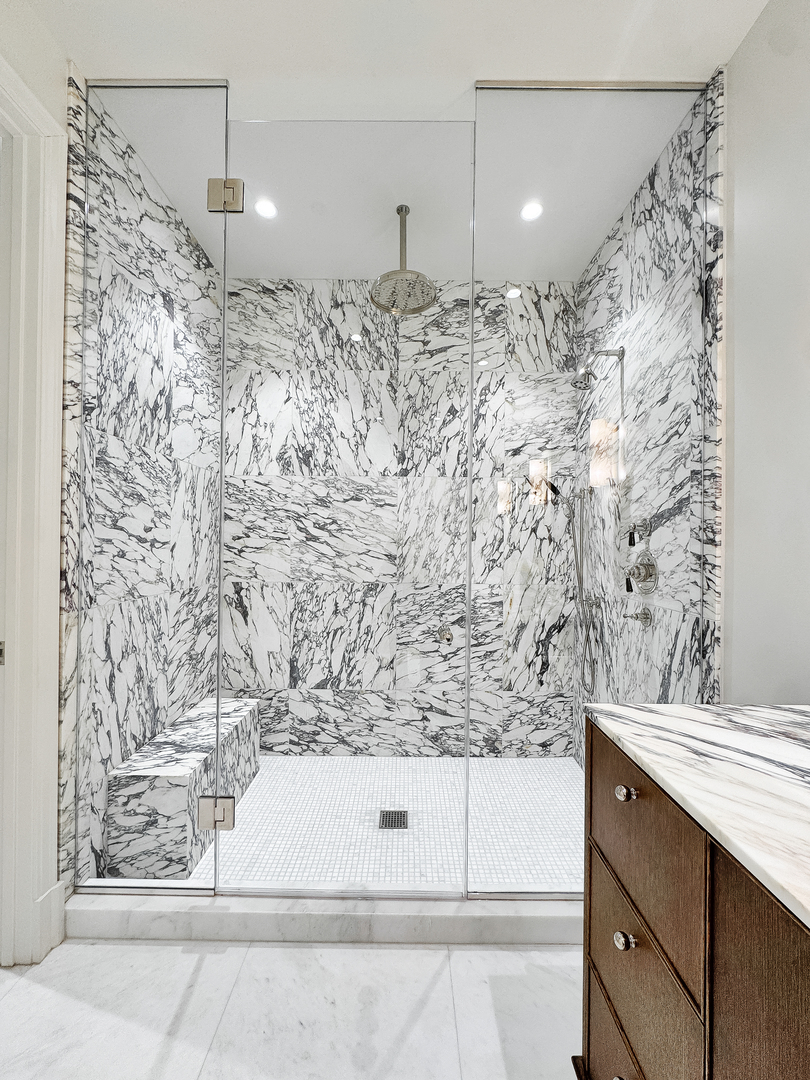 21 North May Street, Unit 802 Chicago, IL 60607 - Photo 27 of 50 a bathroom with a bathtub and shower