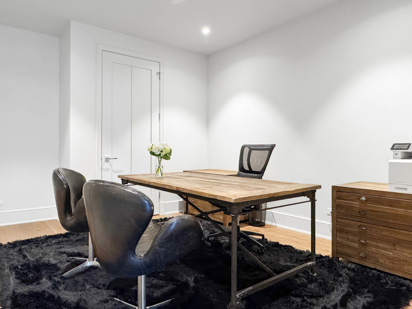 21 North May Street, Unit 802 Chicago, IL 60607 - Photo 32 of 50 a view of a dining room with furniture and wooden floor