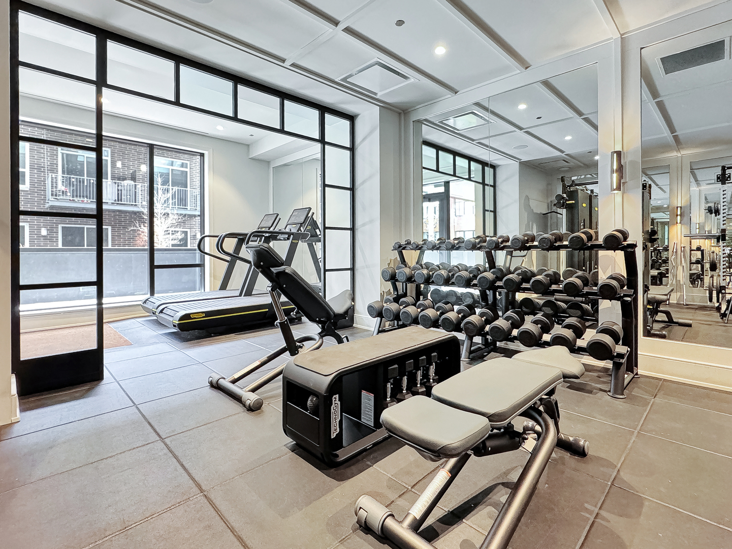 21 North May Street, Unit 802 Chicago, IL 60607 - Photo 41 of 50 a view of a room with gym equipment