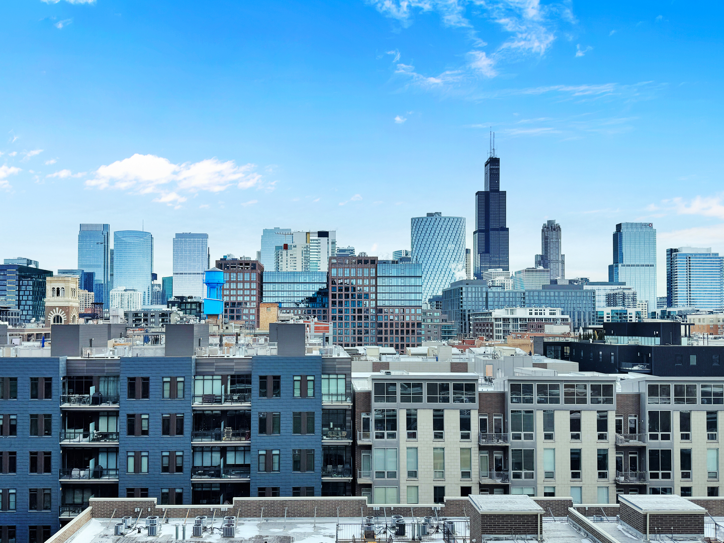 21 North May Street, Unit 802 Chicago, IL 60607 - Photo 9 of 50 a city view with tall buildings