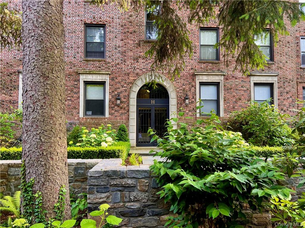 Walk through lovely courtyard to building entrance