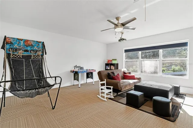 a spacious bathroom with a double vanity sink a mirror a bathtub and