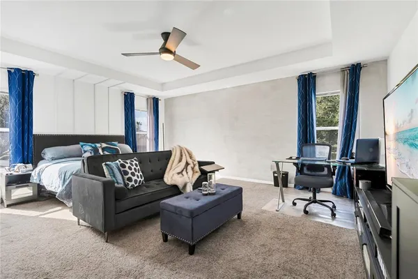 an aerial view of residential building with an ocean view