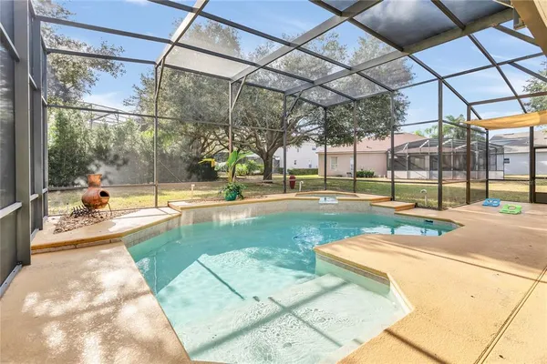 a view of a playground with basketball court