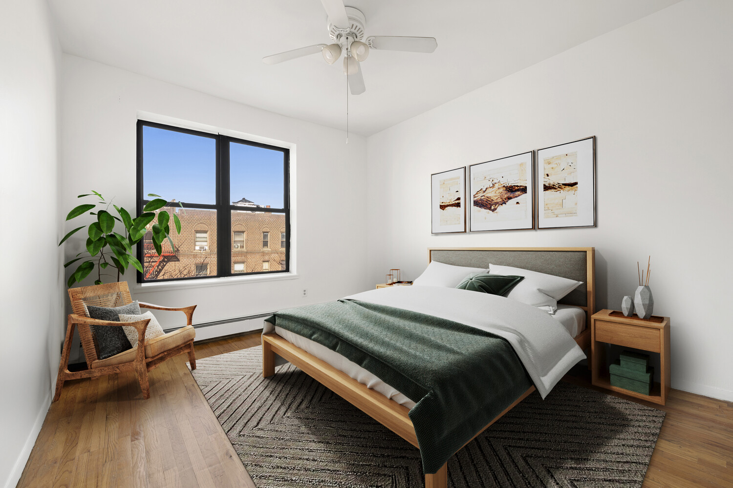 a bedroom with a bed wooden floor and window