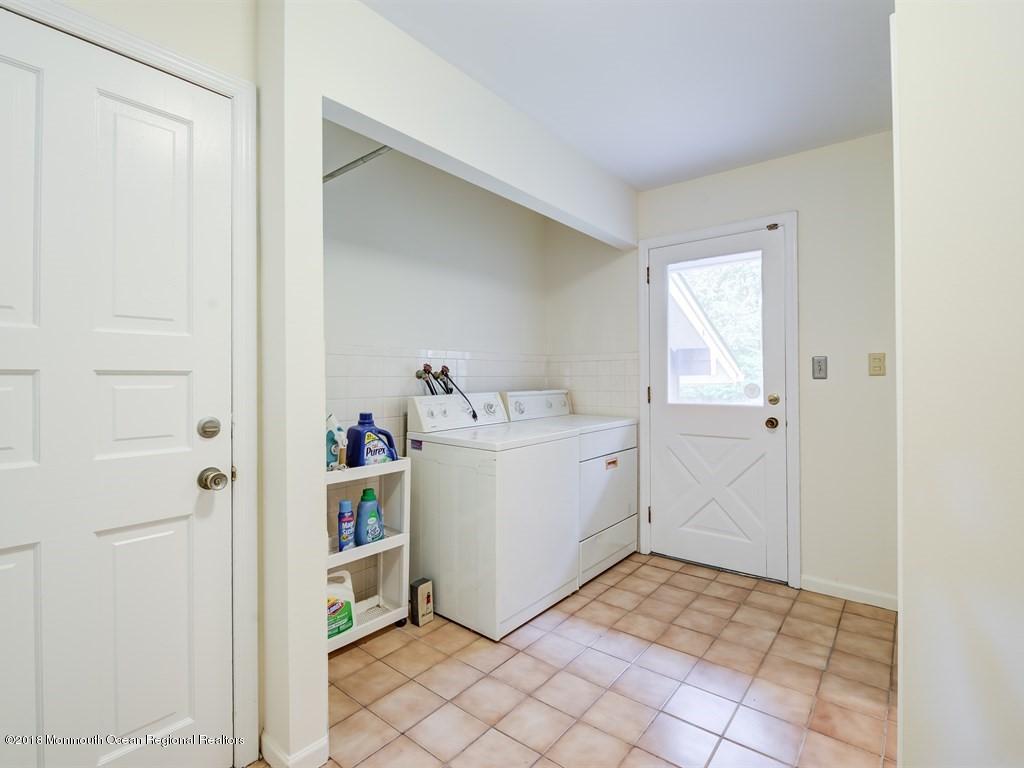 100 Manaqua Road Freehold, NJ 07728 - Photo 29 of 52 029_LAUNDRYMUD ROOM