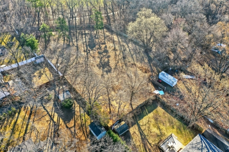1212 Englishtown Road Old Bridge, NJ 08857 - Photo 6 of 6 a aerial view of a house with a yard and wooden fence
