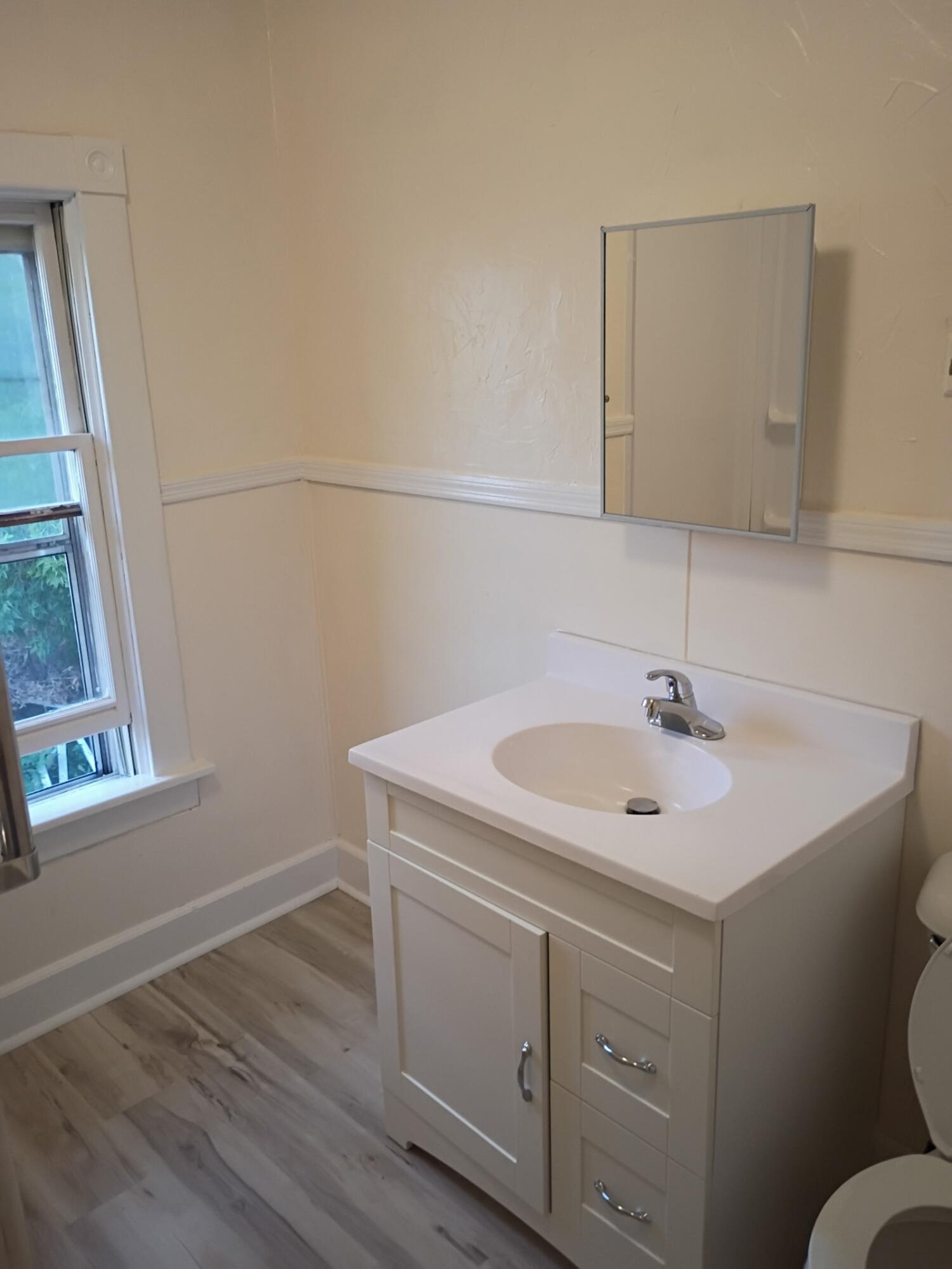 1001 Prospect Street Racine, WI 53404 - Photo 14 of 34 1005 movin phot new sink floor 7:25