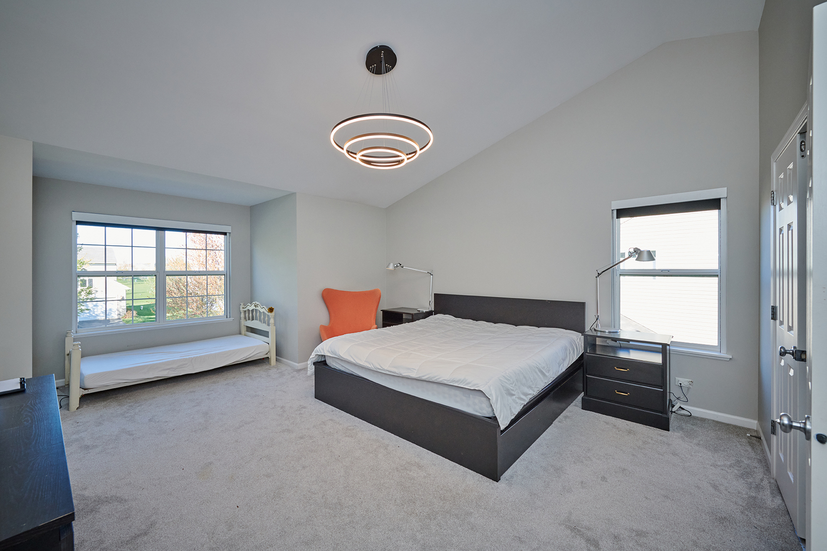 312 Shelbourne Road Volo, IL 60073 - Photo 16 of 54 a spacious bedroom with a bed and a window