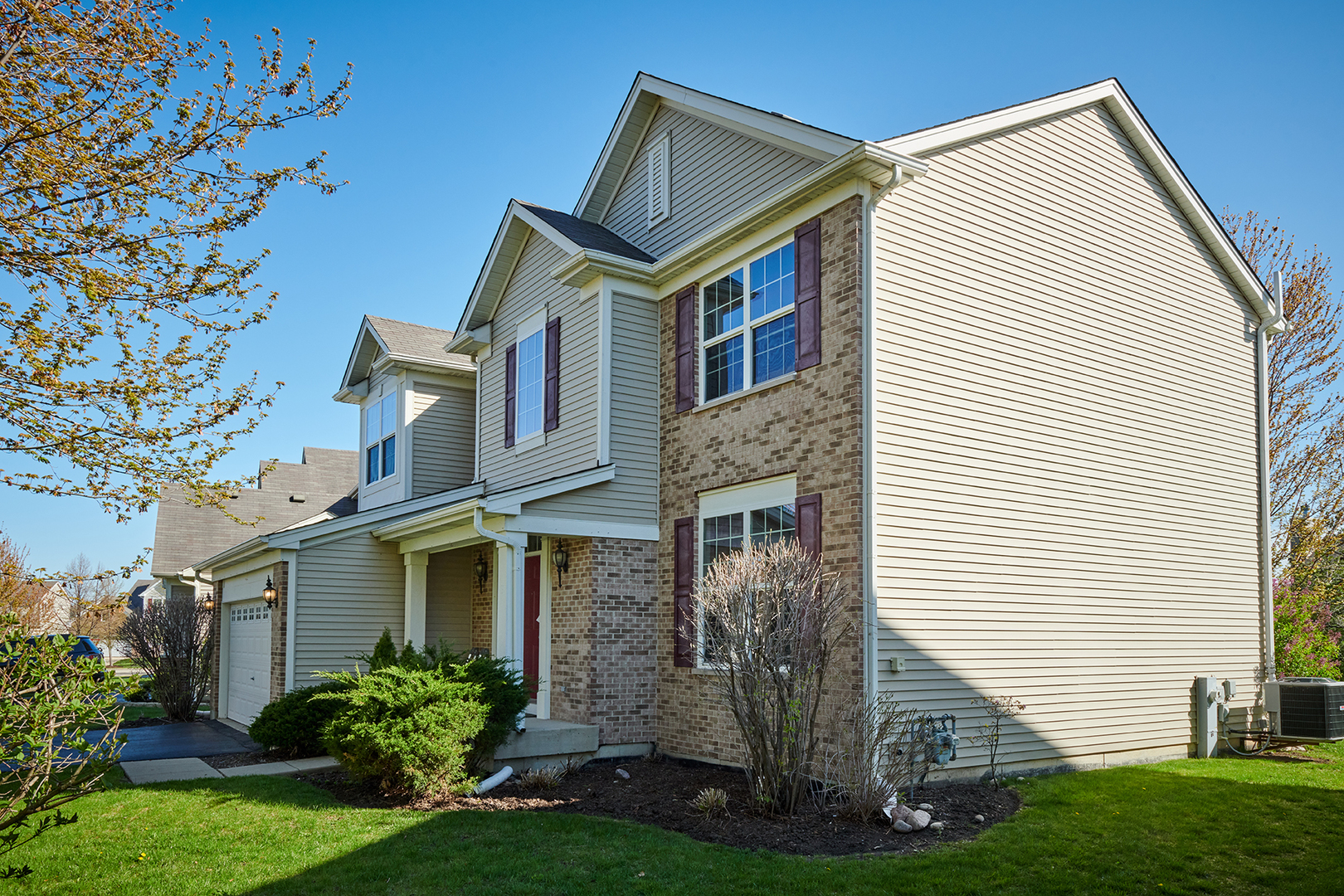 312 Shelbourne Road Volo, IL 60073 - Photo 2 of 54 a front view of a house with a yard