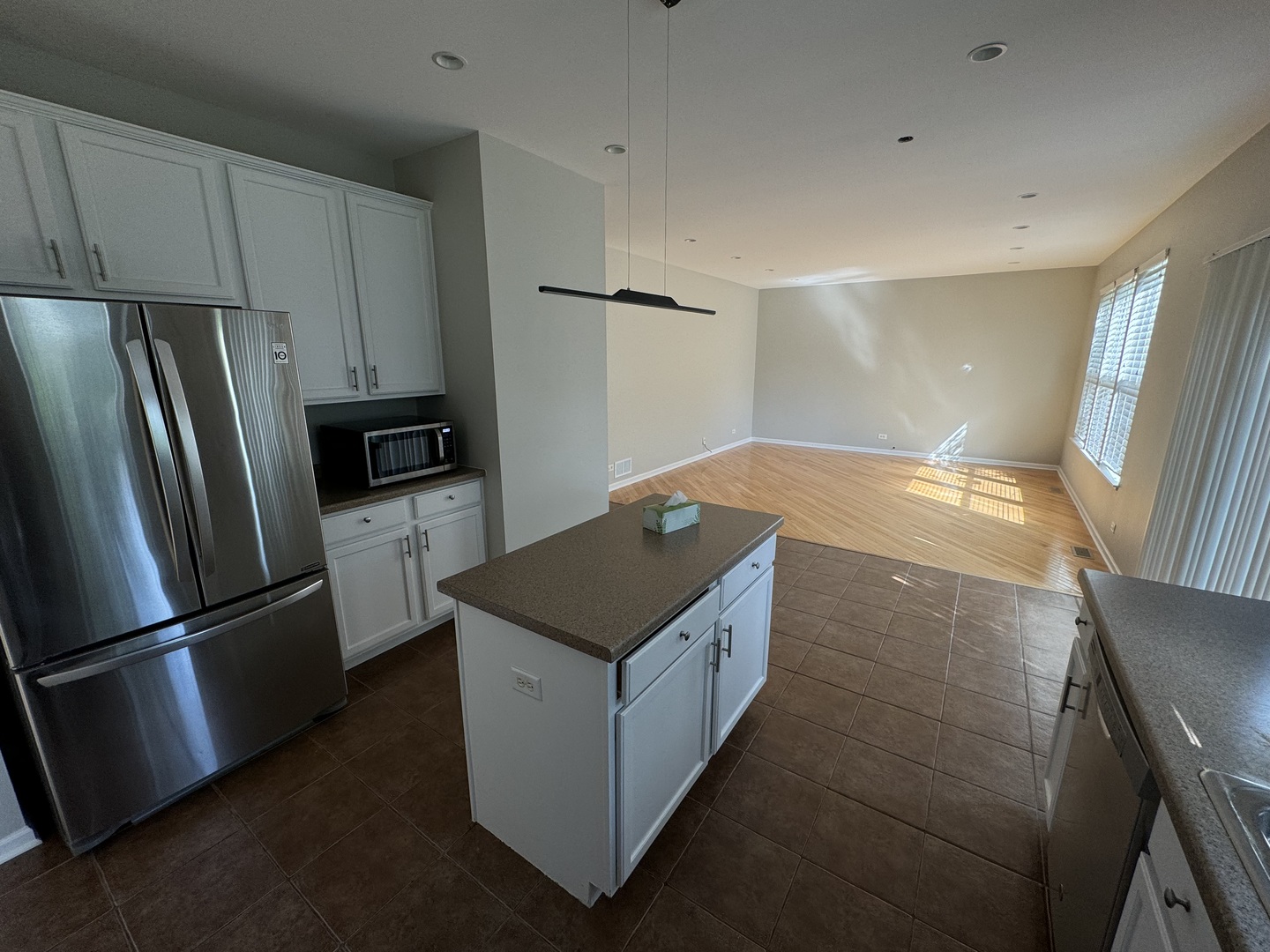 312 Shelbourne Road Volo, IL 60073 - Photo 45 of 54 a kitchen with stainless steel appliances a refrigerator and a counter space
