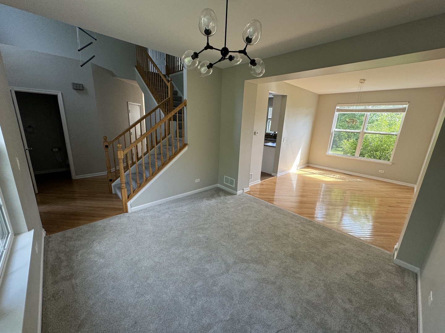 312 Shelbourne Road Volo, IL 60073 - Photo 48 of 54 wooden floor in a hall with an entryway and a window