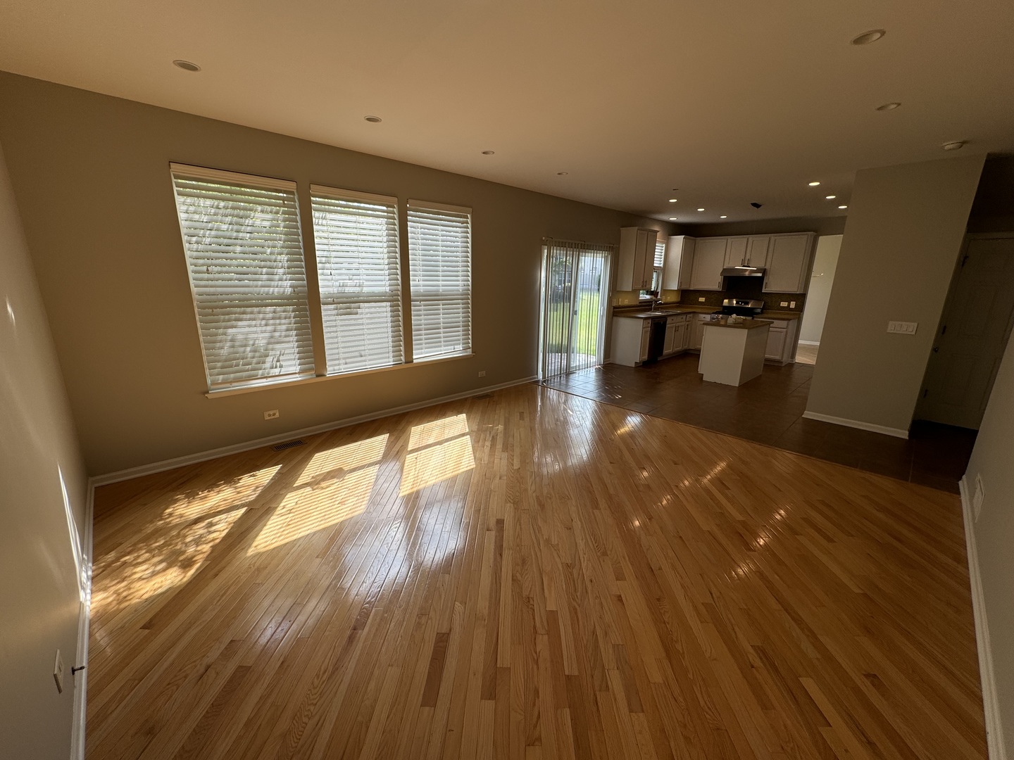 312 Shelbourne Road Volo, IL 60073 - Photo 50 of 54 a view of a living room with wooden floor and a window
