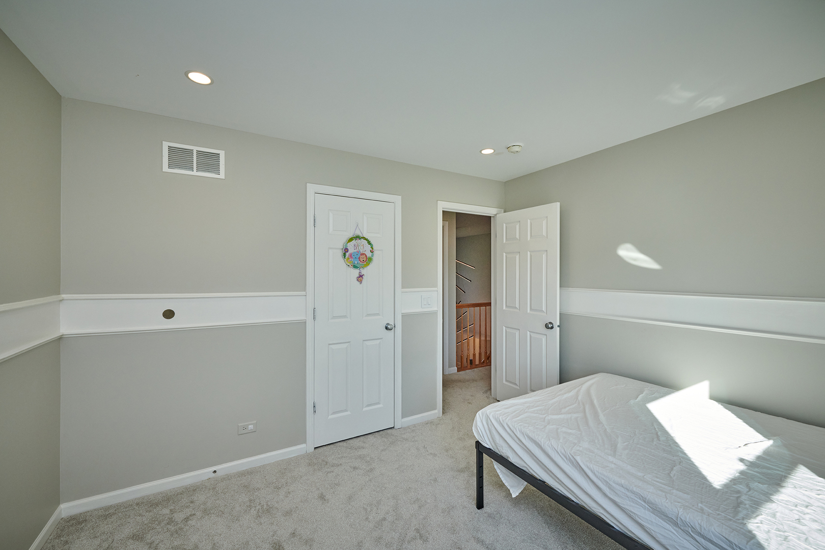 312 Shelbourne Road Volo, IL 60073 - Photo 10 of 54 a bedroom with a bed and cabinets