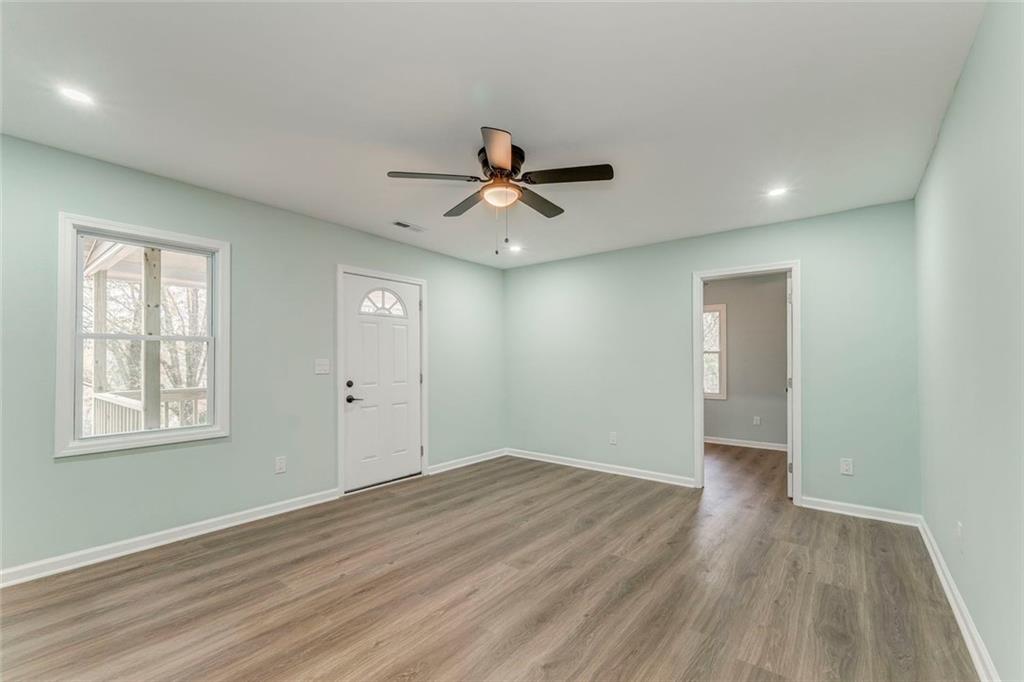 43 King Bee Circle Rome, GA 30161 - Photo 23 of 47 wooden floor in an empty room with a window