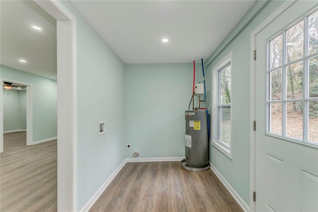 43 King Bee Circle Rome, GA 30161 - Photo 6 of 47 a view of hallway with wooden floor and stairs