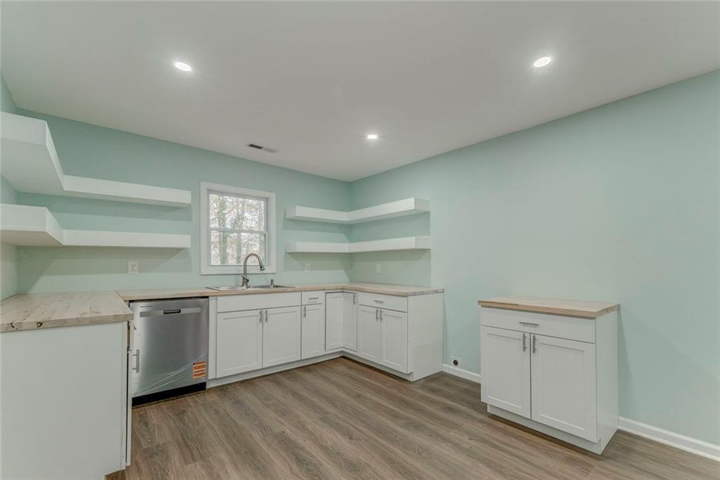 43 King Bee Circle Rome, GA 30161 - Photo 7 of 47 a kitchen with sink and cabinets