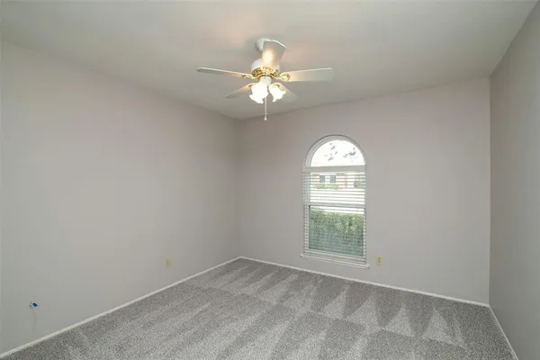 an empty room that has a window