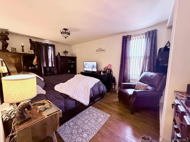 a bed room with two bed and a couch