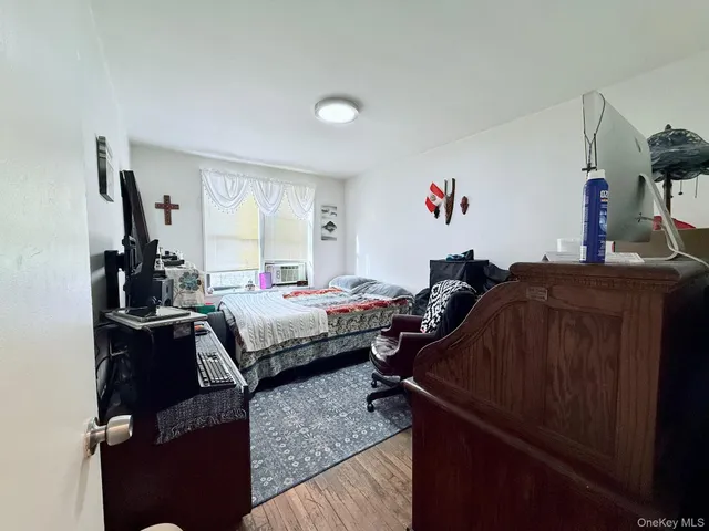 a bed room with a bed and a couch