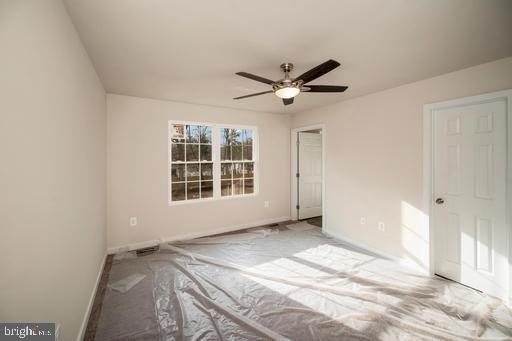 2 Spicers Mill Road Orange, VA 22960 - Photo 26 of 46 a view of a livingroom with a ceiling fan and window