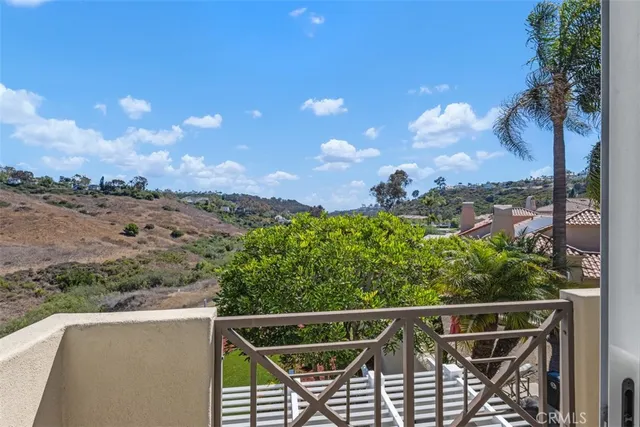 a view of a balcony with an outdoor space