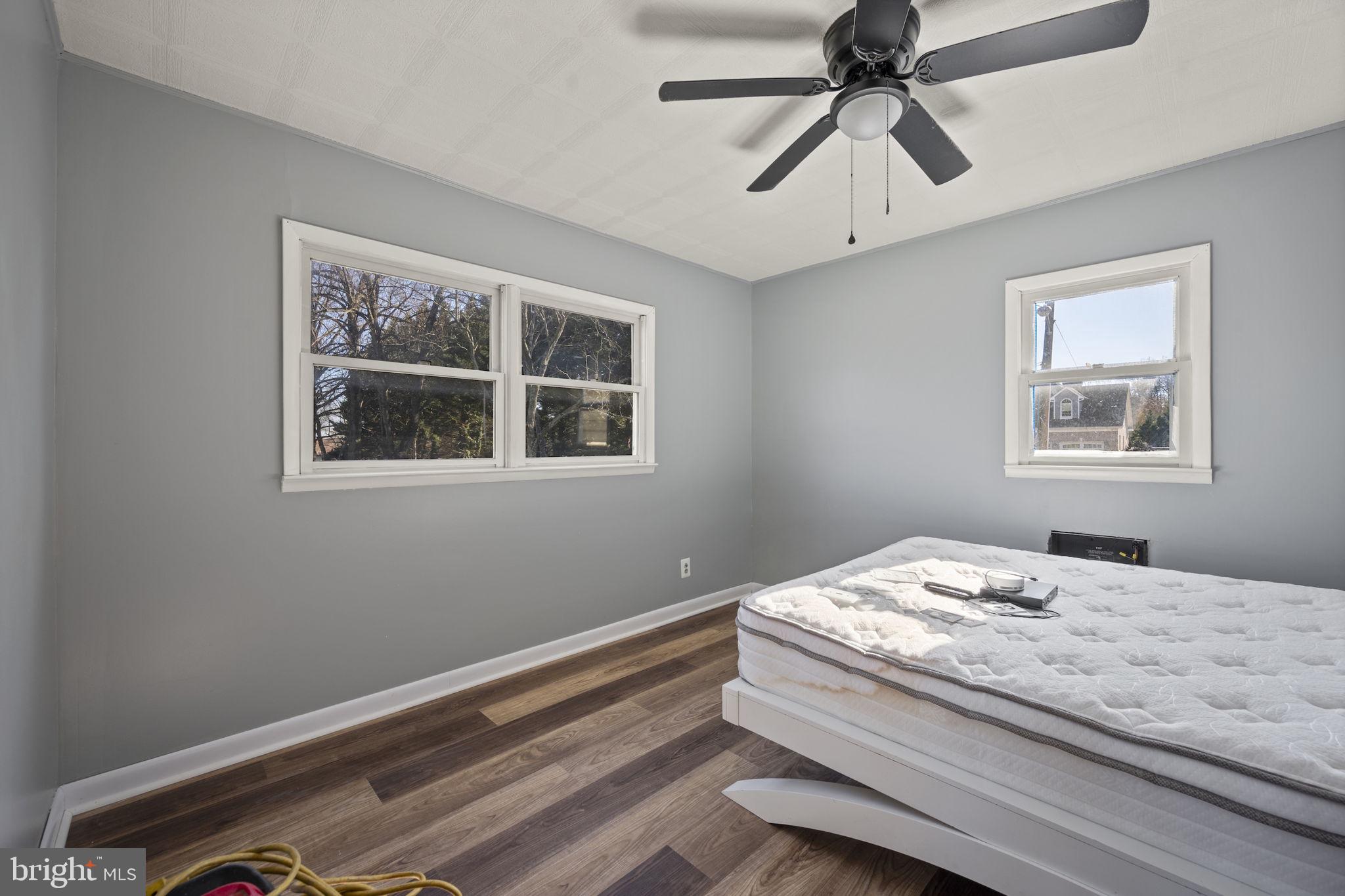 10412 Vincent Road White Marsh, MD 21162 - Photo 24 of 65 a bedroom with a bed and a window