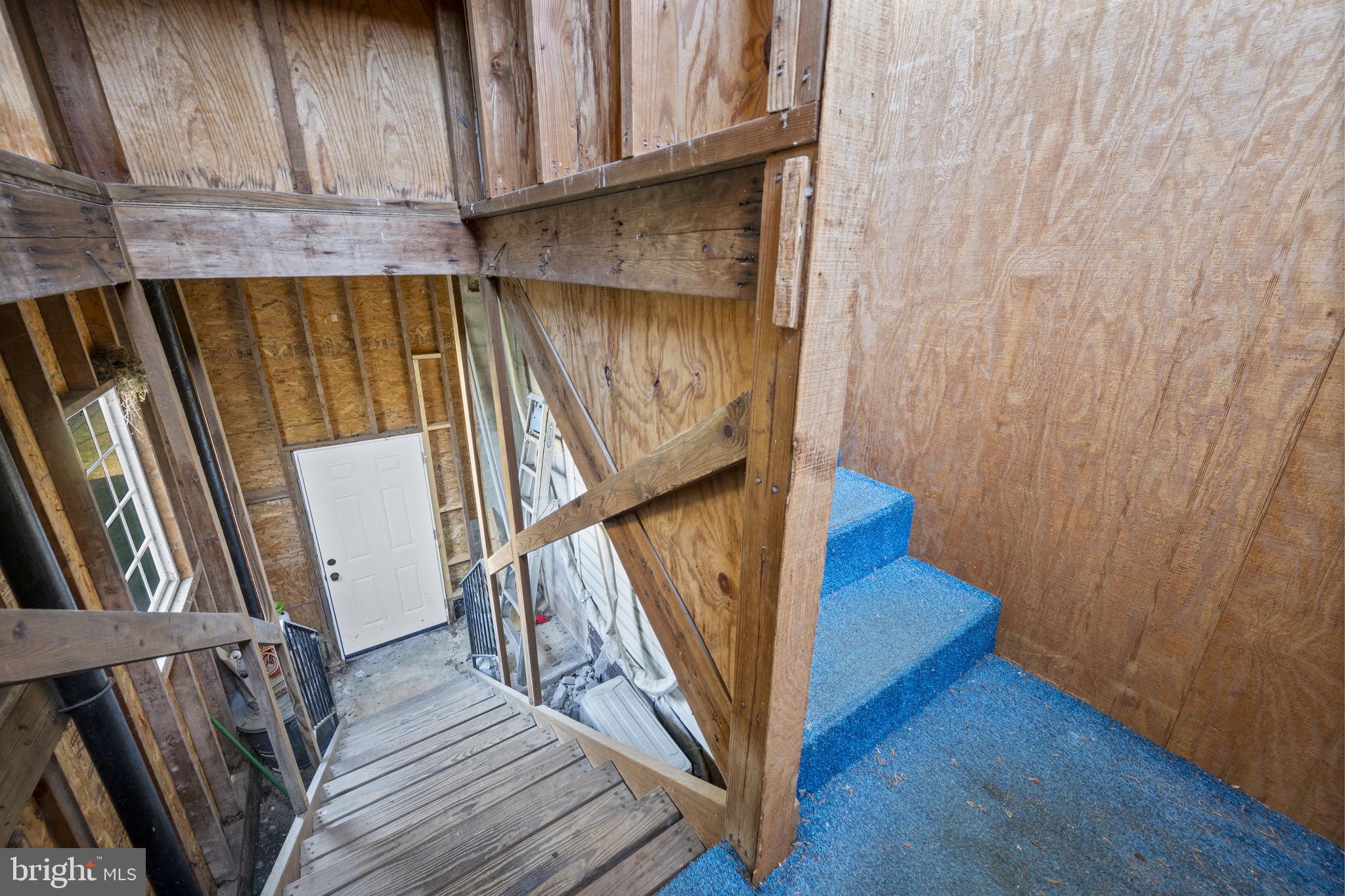 10412 Vincent Road White Marsh, MD 21162 - Photo 30 of 65 a view of staircase with wooden floor and staircase