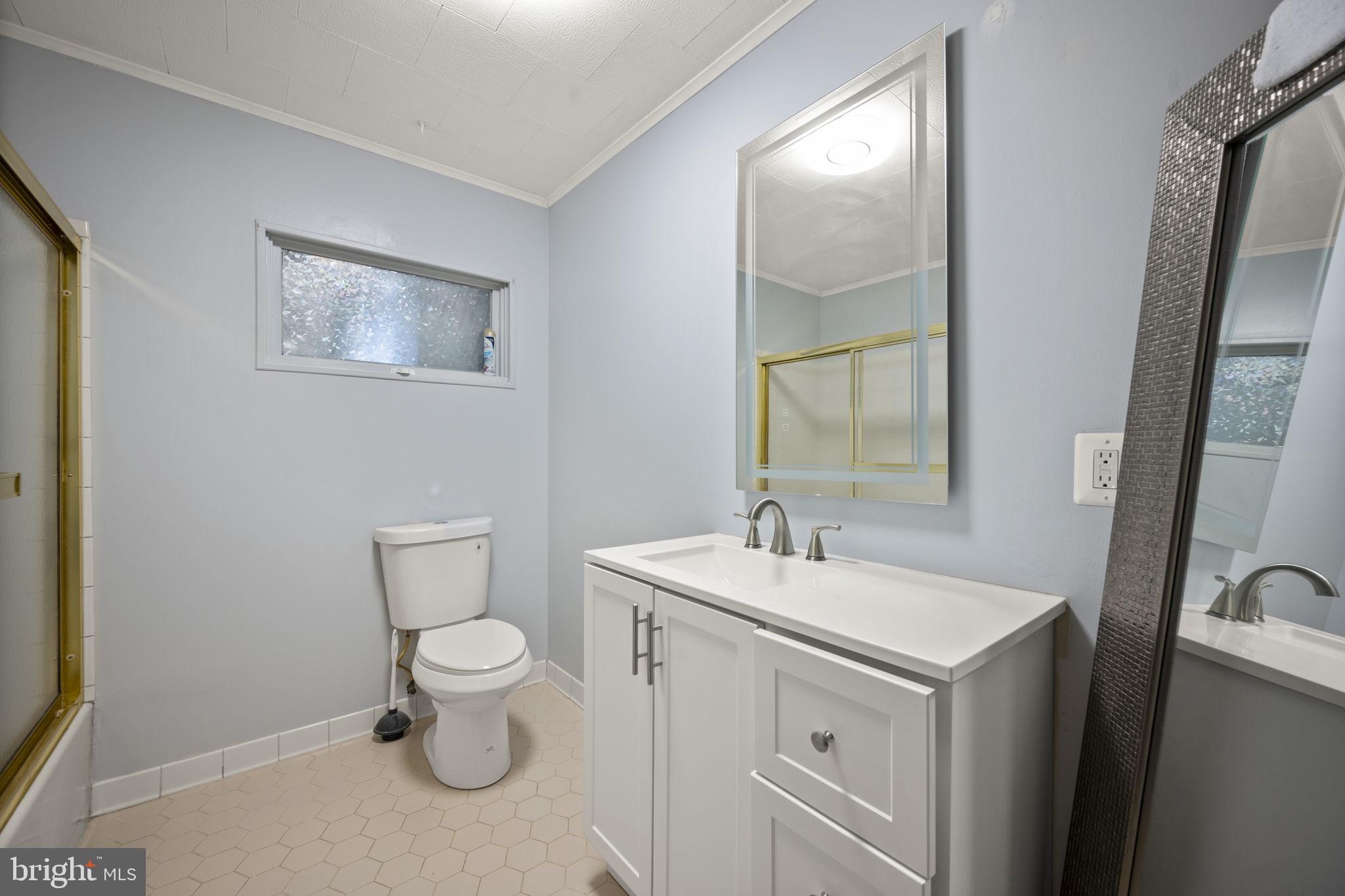 10412 Vincent Road White Marsh, MD 21162 - Photo 31 of 65 a view of bathroom with a sink and a toilet