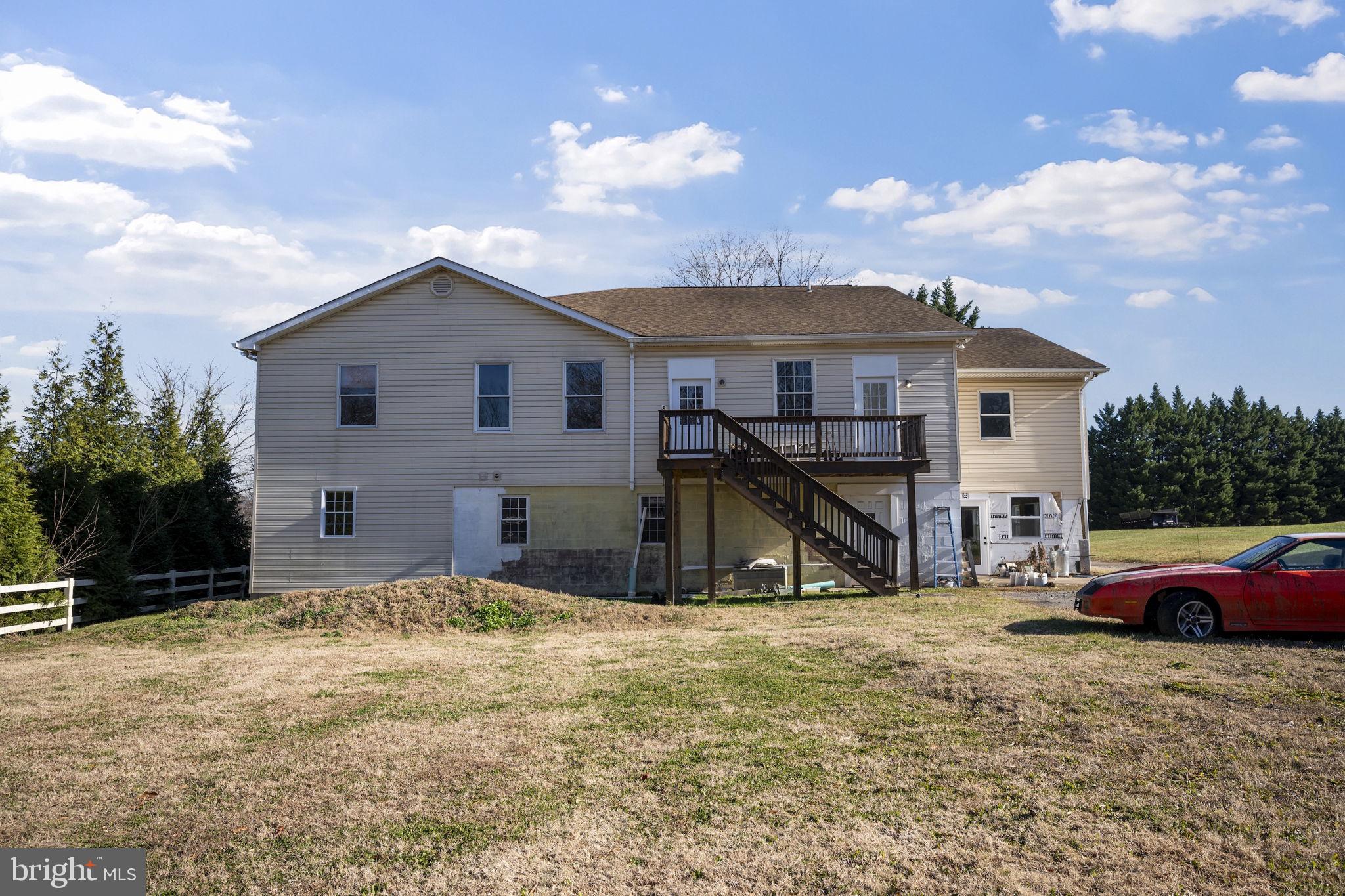 10412 Vincent Road White Marsh, MD 21162 - Photo 4 of 65 a view of a house with a patio