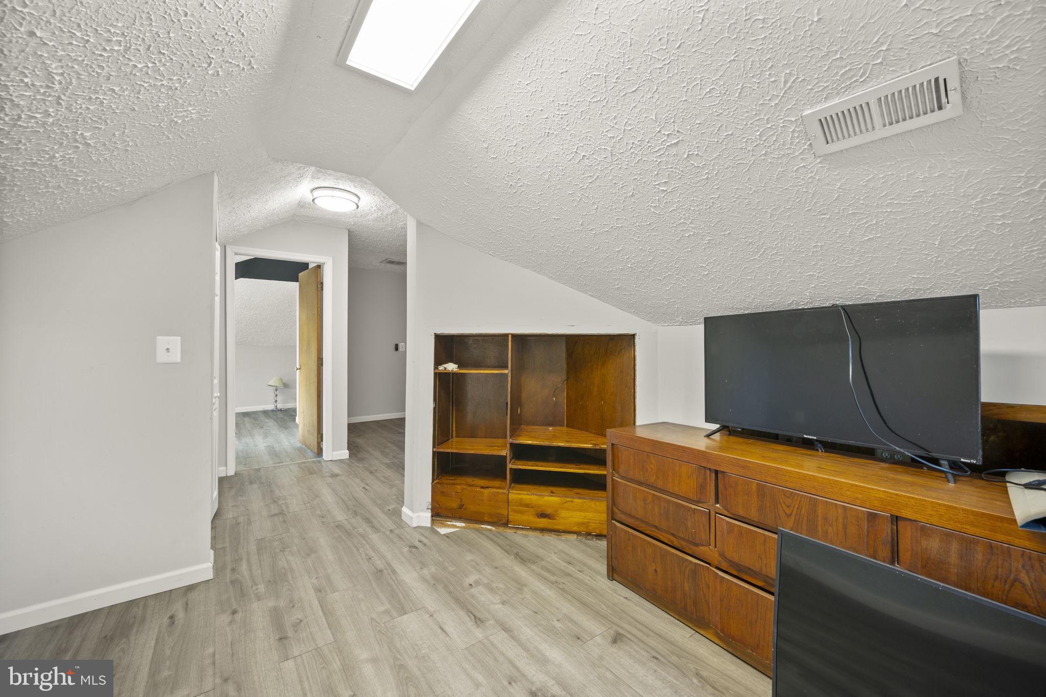 10412 Vincent Road White Marsh, MD 21162 - Photo 41 of 65 a view of room with wooden floor