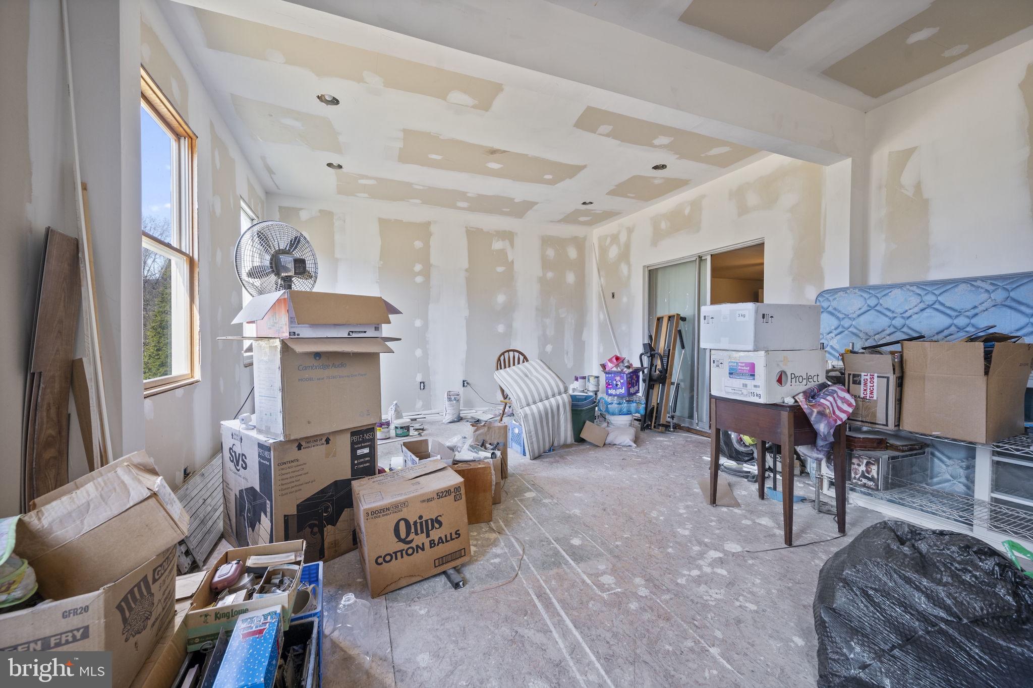 10412 Vincent Road White Marsh, MD 21162 - Photo 56 of 65 a living room with furniture a table and chairs