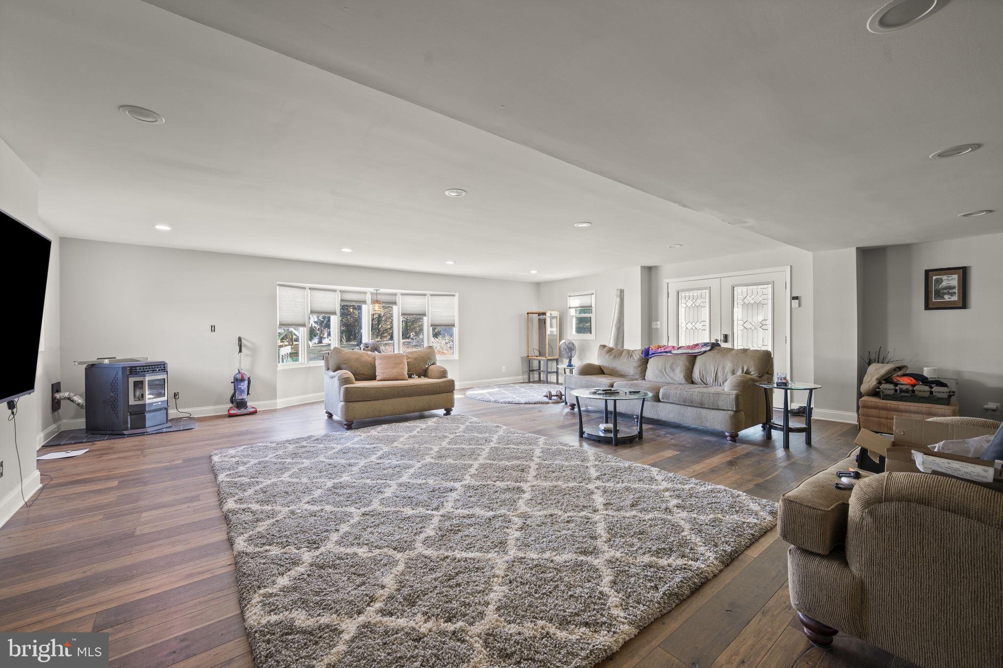 10412 Vincent Road White Marsh, MD 21162 - Photo 9 of 65 a living room with furniture and a flat screen tv