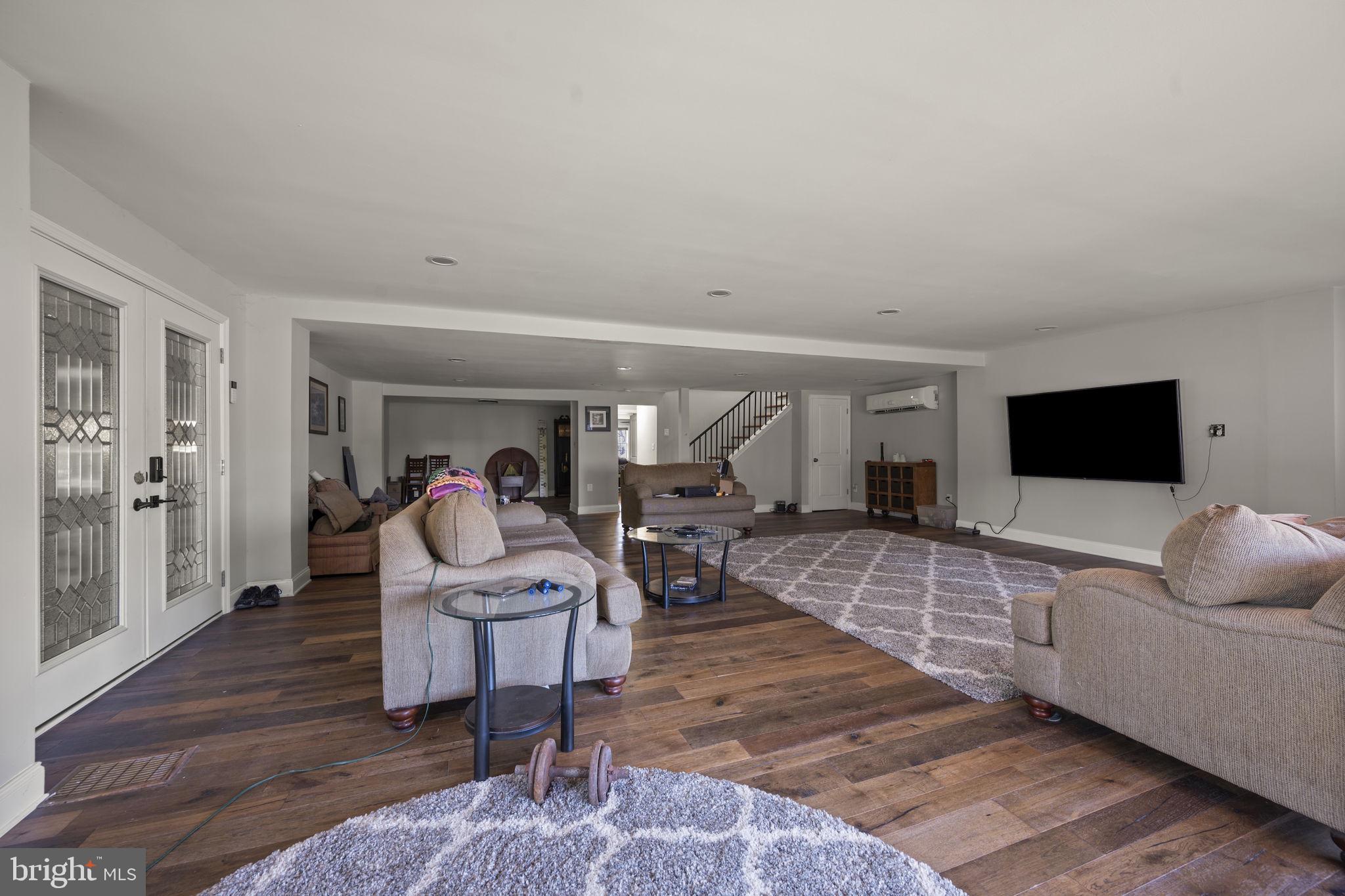 10412 Vincent Road White Marsh, MD 21162 - Photo 10 of 65 a living room with furniture and a flat screen tv