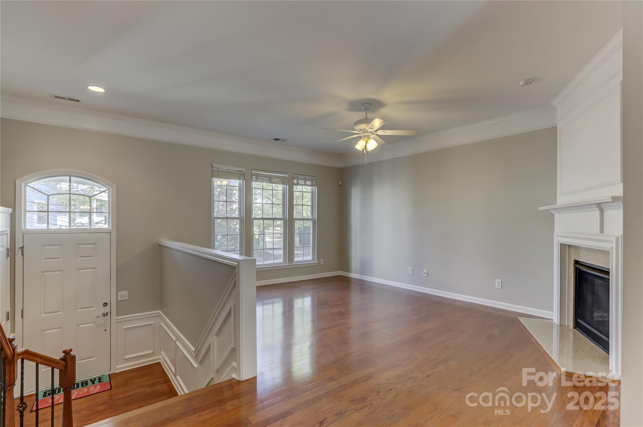 562 6th Baxter Crossing Fort Mill, SC 29708 - Photo 11 of 47 wooden floor in an empty room with a window