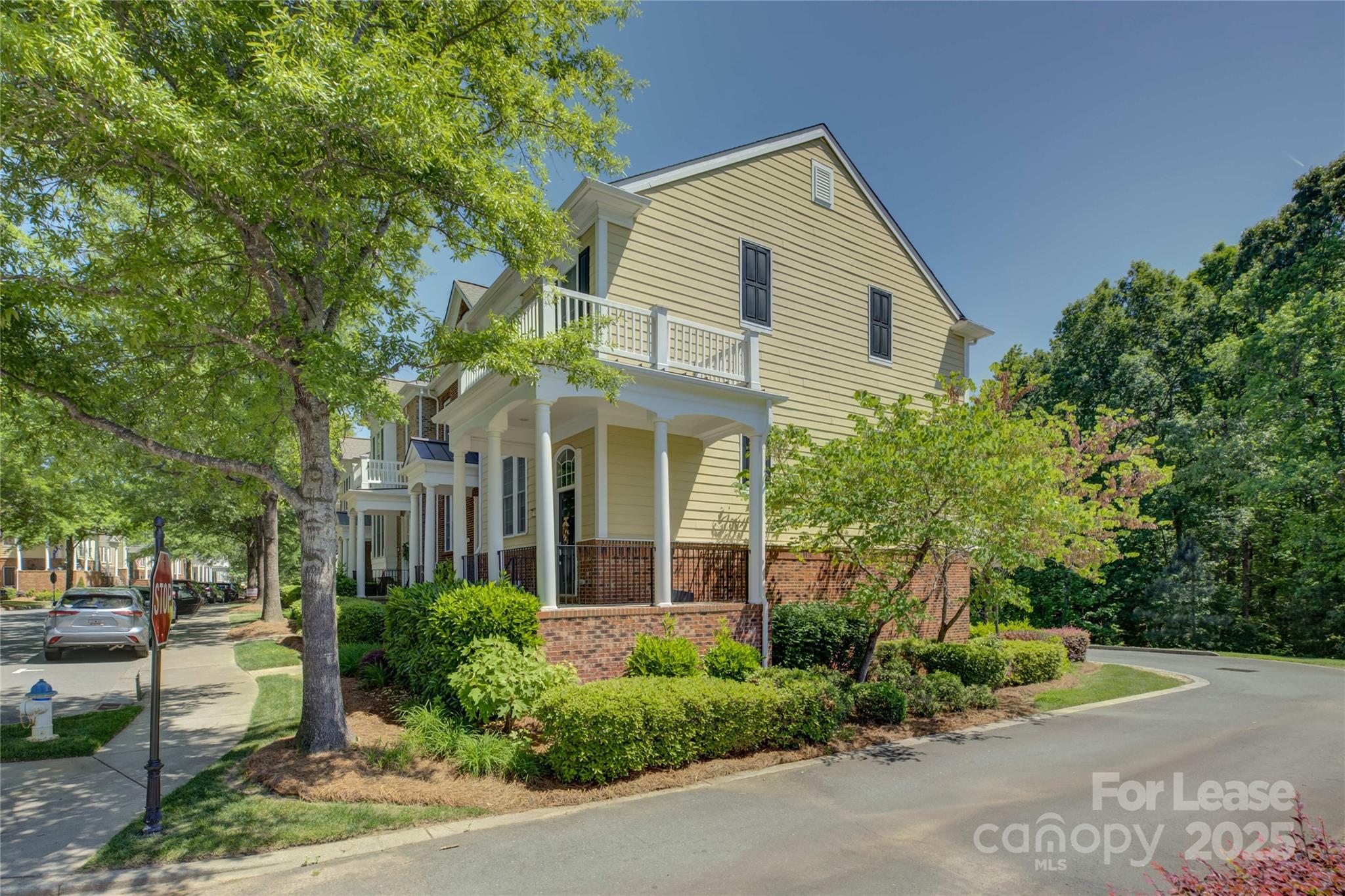 562 6th Baxter Crossing Fort Mill, SC 29708 - Photo 3 of 47 a front view of a house with garden