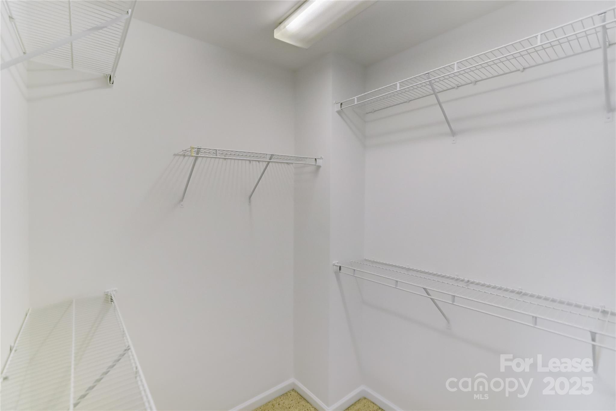 562 6th Baxter Crossing Fort Mill, SC 29708 - Photo 33 of 47 a view of a room with racks on the wall