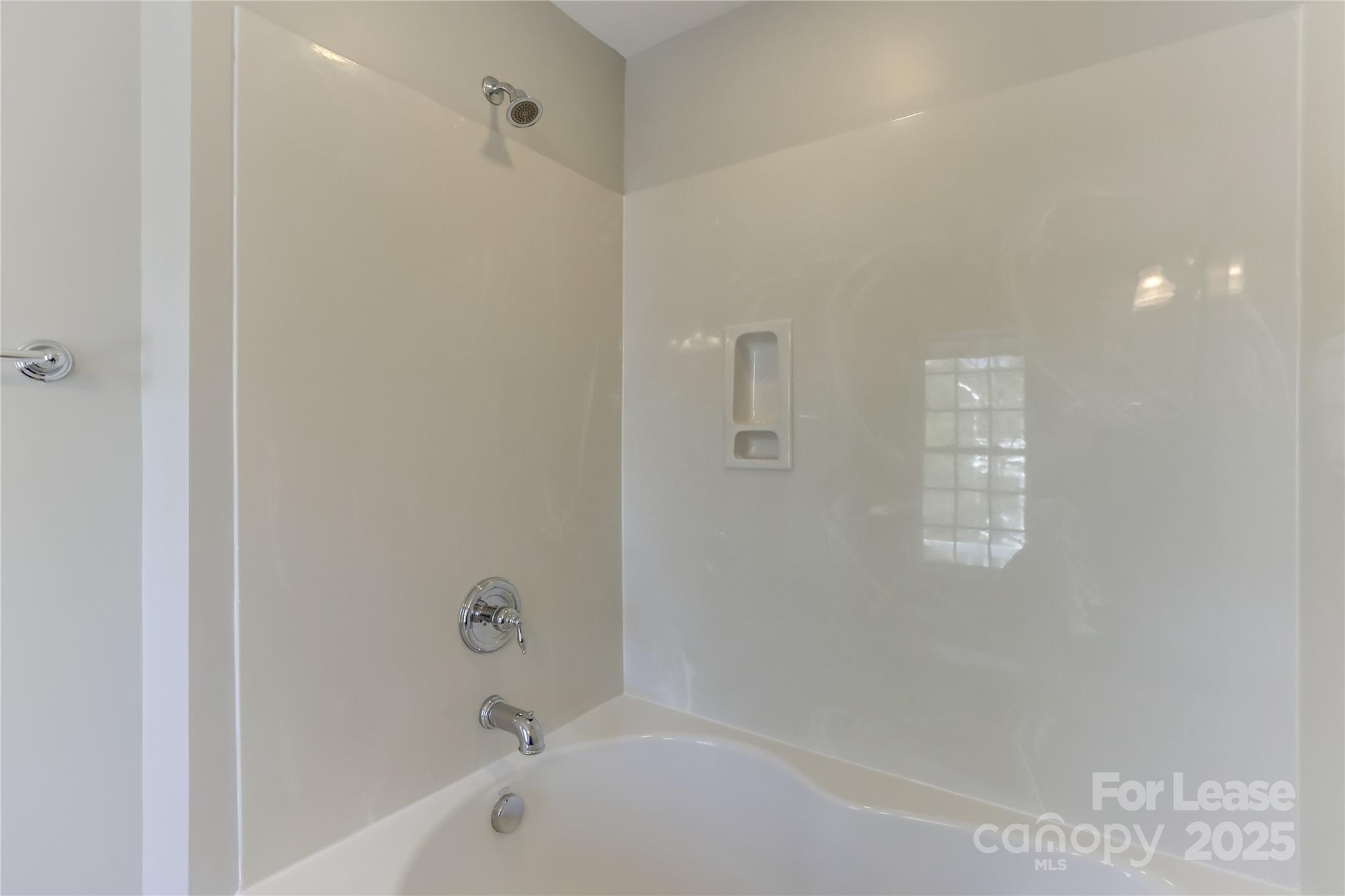 562 6th Baxter Crossing Fort Mill, SC 29708 - Photo 40 of 47 a bathroom with a bathtub