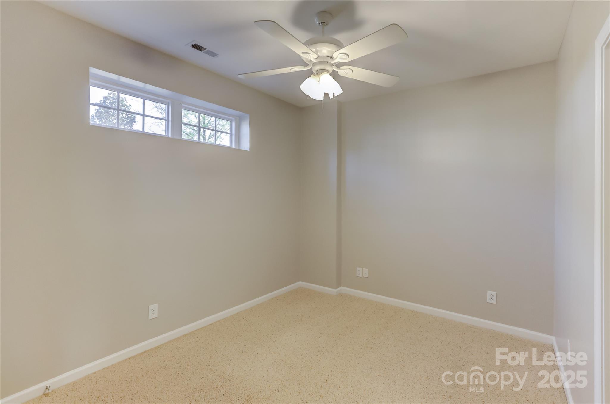 562 6th Baxter Crossing Fort Mill, SC 29708 - Photo 41 of 47 a view of an empty room with a window