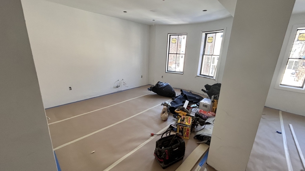 36 Colborne Road, Unit 2 Boston, MA 02135 - Photo 7 of 9 a view of a room with gym equipment