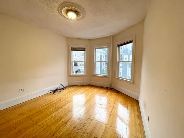 a view of an empty room and window