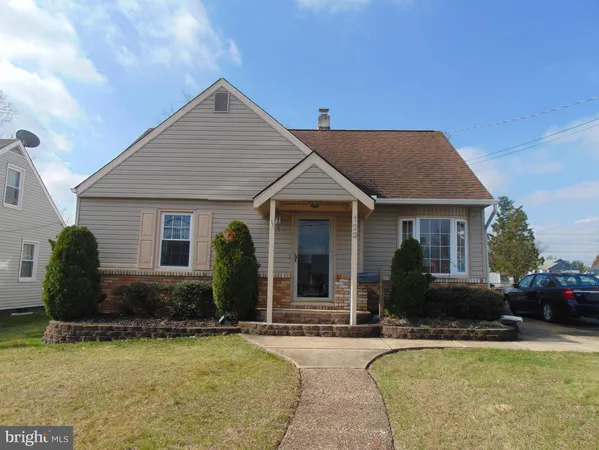 a view of a house with swimming pool and furniture