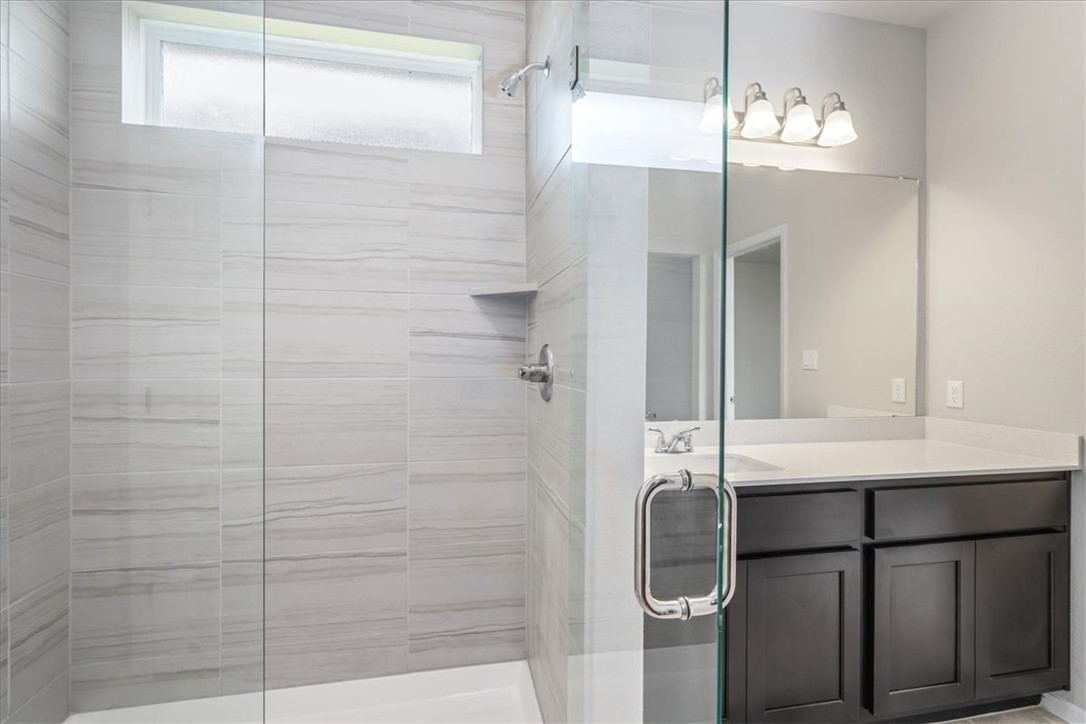 169 Heather Glen Way Maxwell, TX 78656 - Photo 26 of 40 a bathroom with a shower