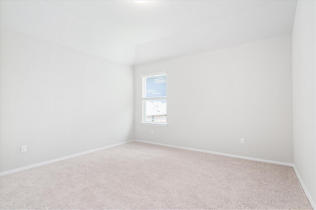 169 Heather Glen Way Maxwell, TX 78656 - Photo 33 of 40 a view of an empty room with a window
