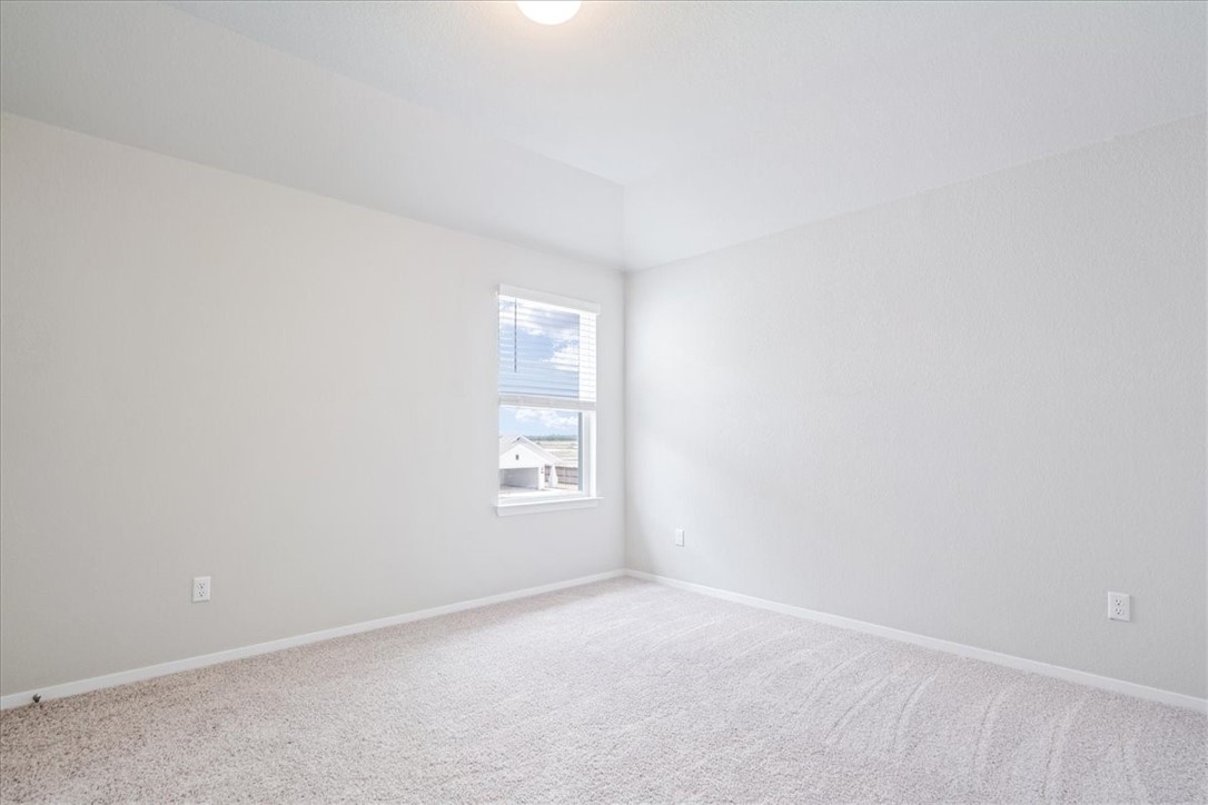 169 Heather Glen Way Maxwell, TX 78656 - Photo 36 of 40 a view of an empty room and a window