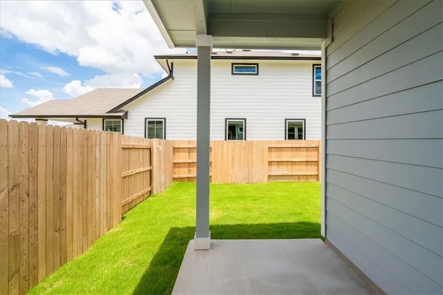 a view of a backyard with plants